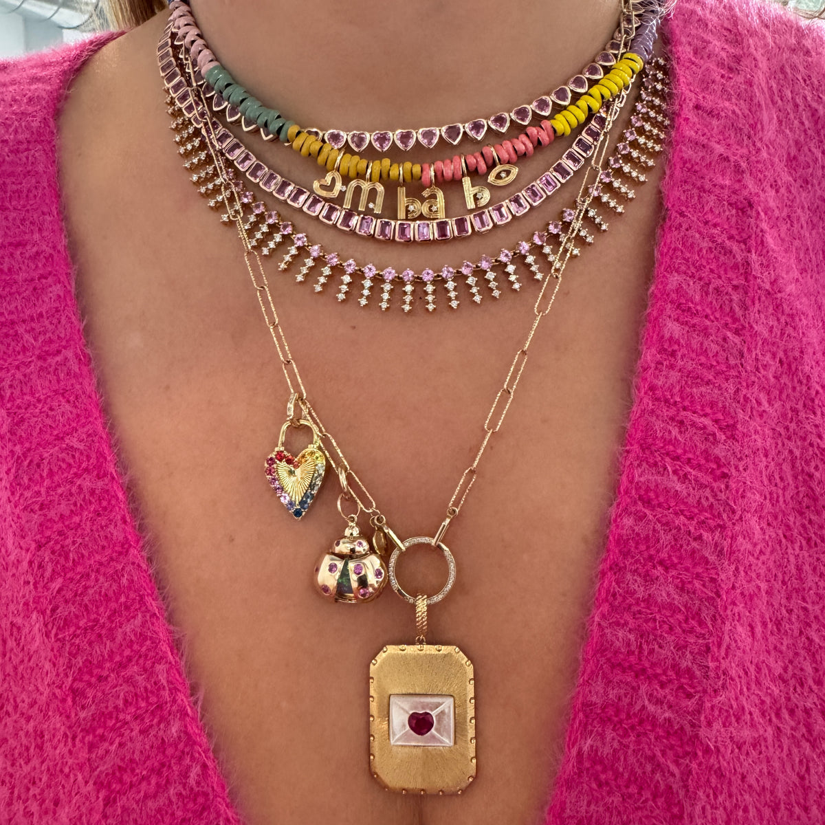 Cupid's Heart Bezel Set Pink Sapphire Tennis Necklace – Milestones Cupid's Heart Bezel Set Pink Sapphire Tennis Necklace – Milestones