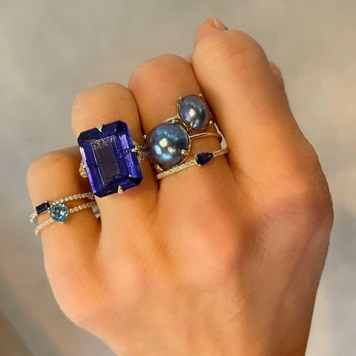 Emerald cut tanzanite and diamond ring on sale