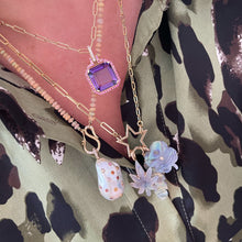 Luminescent Clover Charm