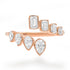 Bezel Set Emerald Cut & Pear Shaped Diamond Bypass Ring