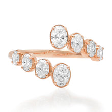 Graduated Bezel Set Oval Diamond Bypass Ring