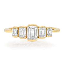 Half Bezel Graduated Emerald Cut Diamond Ring