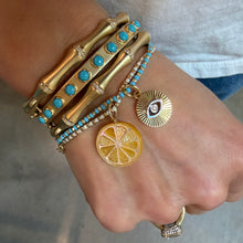 Two-Tone Fluted Diamond Evil Eye Coin Charm