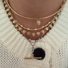 Ribbed Gold Necklace with Round Diamonds