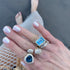 Gossip East-West Blue Topaz Ring with Diamond Frame
